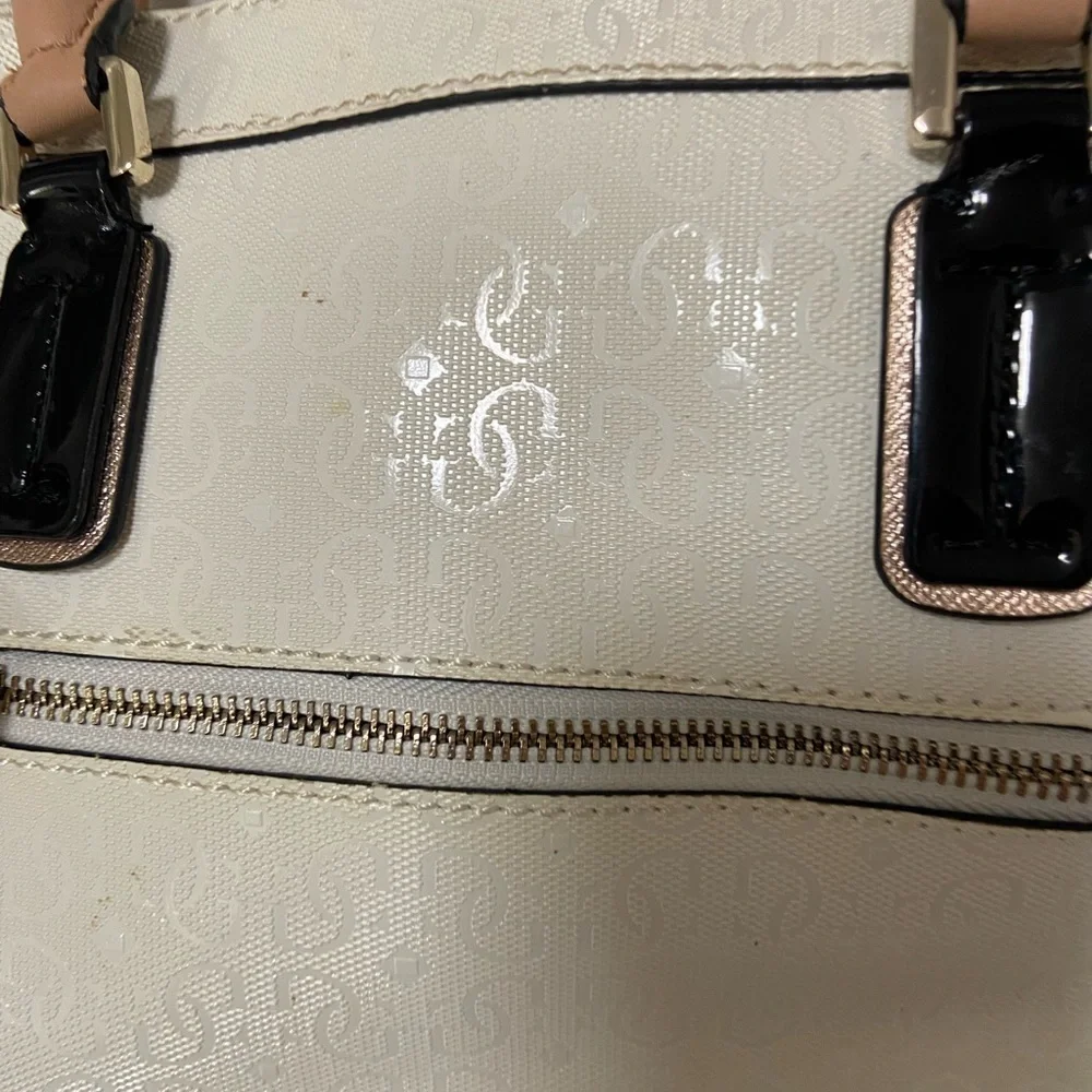 Guess purse cream w black flowers useful but well loved $49